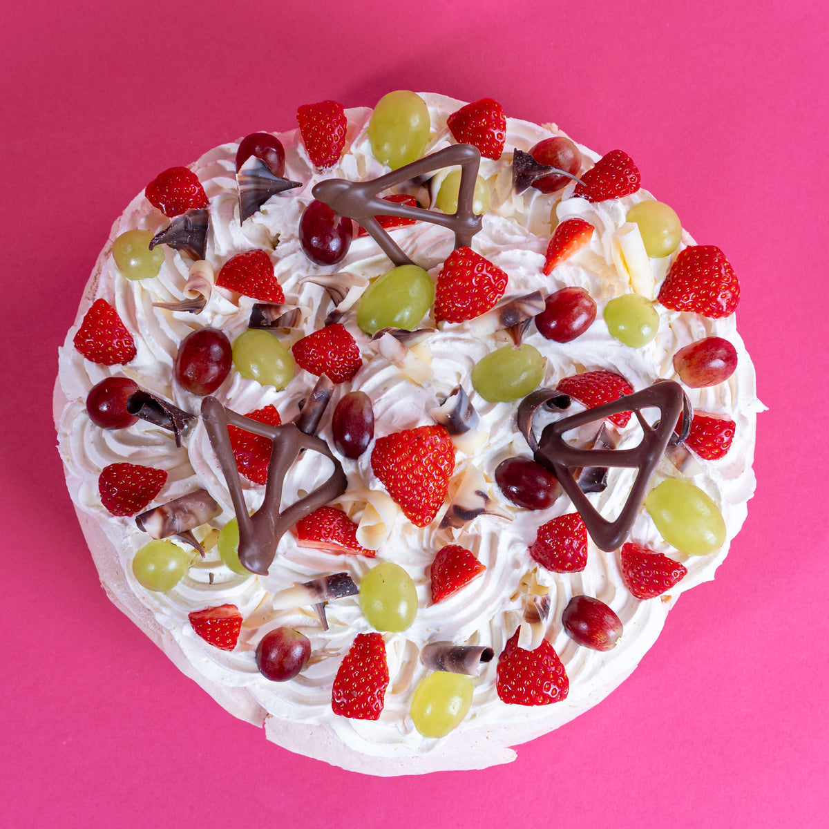 Pavlova with Signature Cream &amp; Seasonal Fruits (Serves 10-12)